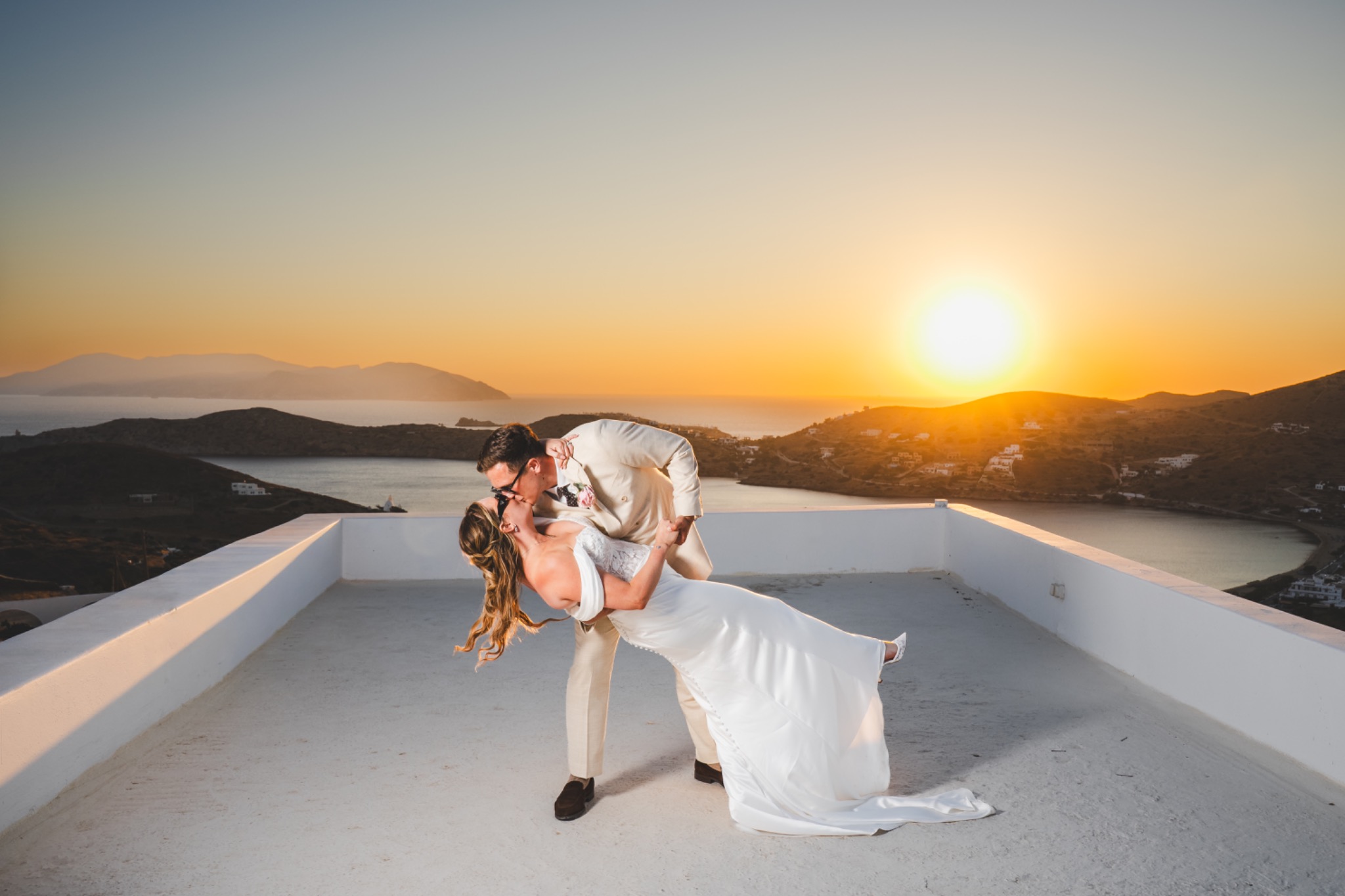 Georgie and Callum at sunset overlooking Ios